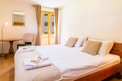 Ein Bett oder Betten in einem Zimmer der Unterkunft Chalet Aquila 2