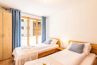 Ein Bett oder Betten in einem Zimmer der Unterkunft Chalet Aquila 2