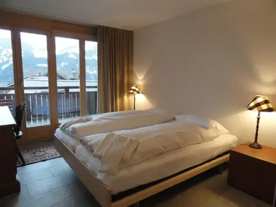 Ein Bett oder Betten in einem Zimmer der Unterkunft Chalet Bella Vista 6