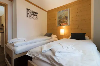 Ein Bett oder Betten in einem Zimmer der Unterkunft Chalet Brunner 3
