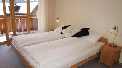 Ein Bett oder Betten in einem Zimmer der Unterkunft Chalet Bella Vista 3