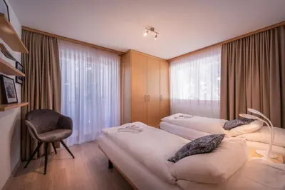 Ein Bett oder Betten in einem Zimmer der Unterkunft Chalet Brunner 2