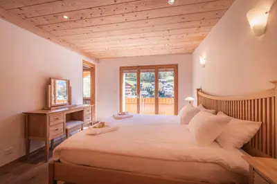 Ein Bett oder Betten in einem Zimmer der Unterkunft Chalet Aquila 8 Penthouse