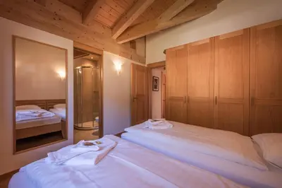 Ein Bett oder Betten in einem Zimmer der Unterkunft Chalet Aquila 8 Penthouse