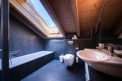 Ein Badezimmer in der Unterkunft Chalet Aquila 7 Penthouse