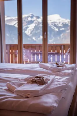 Ein Bett oder Betten in einem Zimmer der Unterkunft Chalet Aquila 7 Penthouse