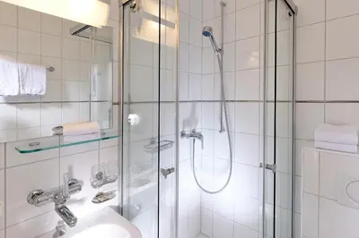 Ein Badezimmer in der Unterkunft Hotel Beausite Budget
