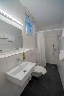 Ein Badezimmer in der Unterkunft Hotel Beausite Budget