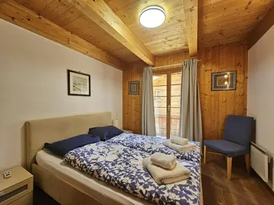 Ein Bett oder Betten in einem Zimmer der Unterkunft Mountain Village 11