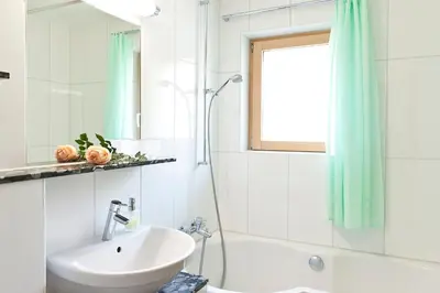 Ein Badezimmer in der Unterkunft Pollux Family Apartment