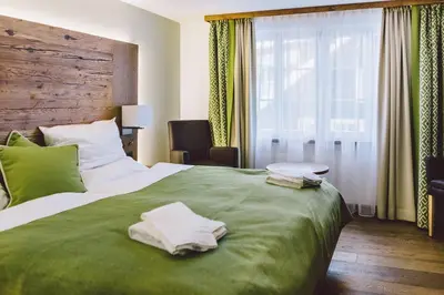 Ein Bett oder Betten in einem Zimmer der Unterkunft Hotel & Restaurant Zum Schwarzen Bären