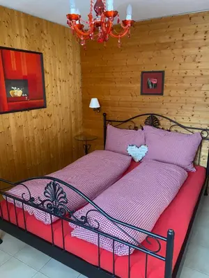 Ein Bett oder Betten in einem Zimmer der Unterkunft Ferienwohnung Allalinblick