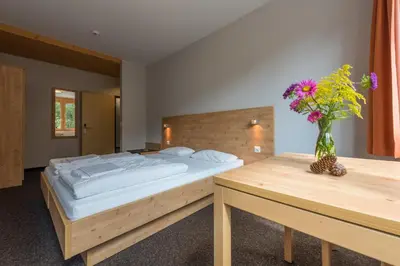 Ein Bett oder Betten in einem Zimmer der Unterkunft Sport Resort Fiesch - Fiescher Hostel