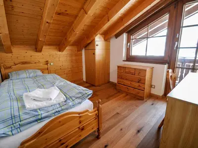 Ein Bett oder Betten in einem Zimmer der Unterkunft Apartment Bergere-1 by Interhome