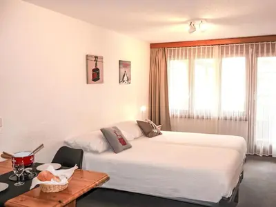 Ein Bett oder Betten in einem Zimmer der Unterkunft Apartment Haus Bellevue-6 by Interhome