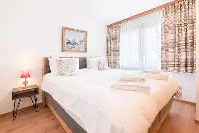 Ein Bett oder Betten in einem Zimmer der Unterkunft Chalet Ulysse