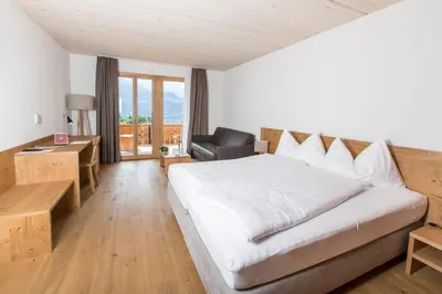 Ein Bett oder Betten in einem Zimmer der Unterkunft Hotel Reuti