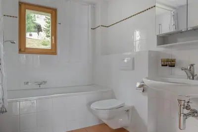 Ein Badezimmer in der Unterkunft Alpengarten 4