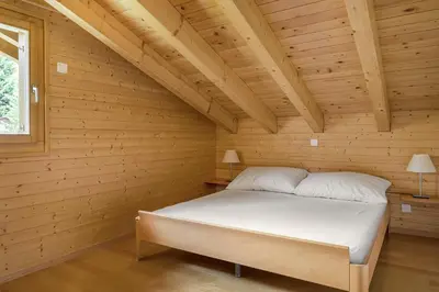 Ein Bett oder Betten in einem Zimmer der Unterkunft Alpengarten 7