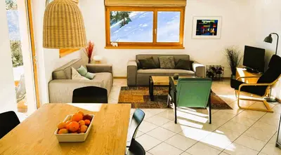 Ein Sitzbereich in der Unterkunft Bettmerlodge