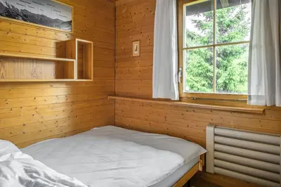 Ein Bett oder Betten in einem Zimmer der Unterkunft Brigerblick OG