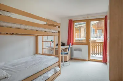Ein Bett oder Betten in einem Zimmer der Unterkunft Camelot 4