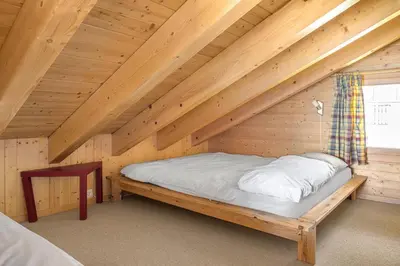 Ein Bett oder Betten in einem Zimmer der Unterkunft Fata Morgana 6