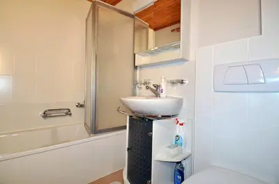 Ein Badezimmer in der Unterkunft Harpa OG