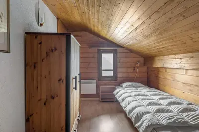 Ein Bett oder Betten in einem Zimmer der Unterkunft Polaris