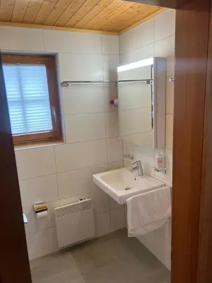 Ein Badezimmer in der Unterkunft Toggi OG