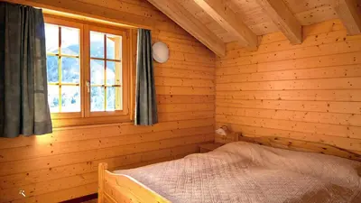 Ein Bett oder Betten in einem Zimmer der Unterkunft Cresta