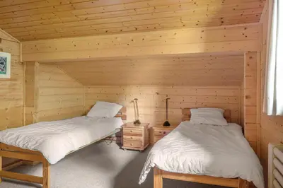 Ein Bett oder Betten in einem Zimmer der Unterkunft Lotus OG