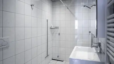 Ein Badezimmer in der Unterkunft Stachelbeere UG