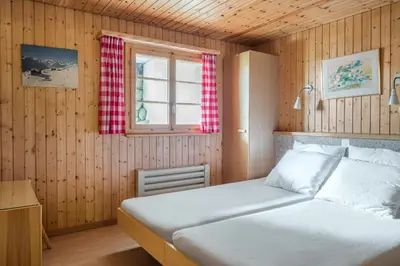 Ein Bett oder Betten in einem Zimmer der Unterkunft Wasserhügeli