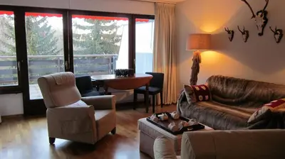 Ein Sitzbereich in der Unterkunft Apartment Humagne - Crans-Montana Center