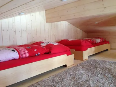 Ein Bett oder Betten in einem Zimmer der Unterkunft Chalet Blatti