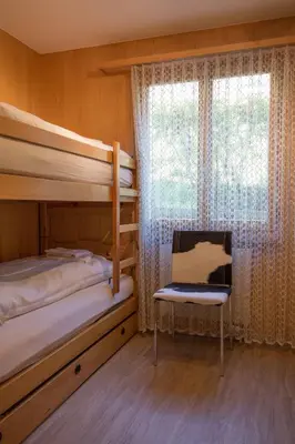 Ein Bett oder Betten in einem Zimmer der Unterkunft Ferienwohnung Helios