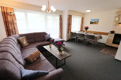 Ein Sitzbereich in der Unterkunft Apartment Azur