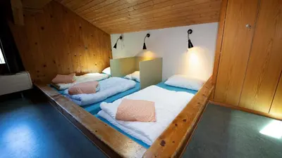 Ein Bett oder Betten in einem Zimmer der Unterkunft Brienz Youth Hostel