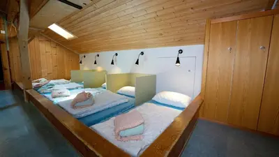 Ein Bett oder Betten in einem Zimmer der Unterkunft Brienz Youth Hostel