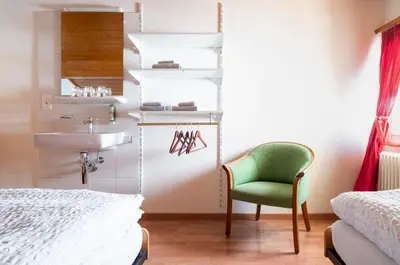 Ein Bett oder Betten in einem Zimmer der Unterkunft Hotel Schwarzsee