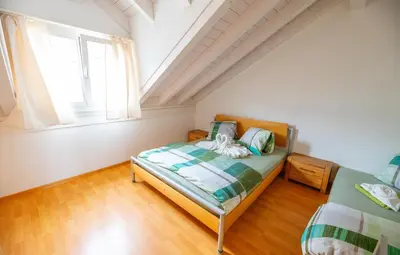 Ein Bett oder Betten in einem Zimmer der Unterkunft Blumenstrasse 22