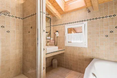 Ein Badezimmer in der Unterkunft BaseCamp Apartments
