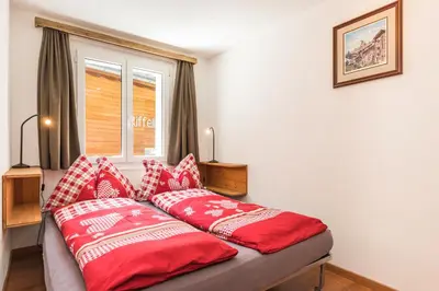 Ein Bett oder Betten in einem Zimmer der Unterkunft BaseCamp Apartments