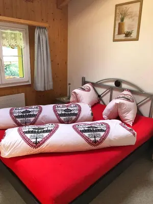 Ein Bett oder Betten in einem Zimmer der Unterkunft Chalet Verbrunnenhaus Grindelwald