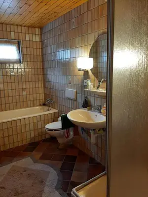 Ein Badezimmer in der Unterkunft Chalet Blettner