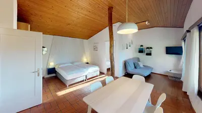 Ein Bett oder Betten in einem Zimmer der Unterkunft Reka-Ferienanlage Brissago
