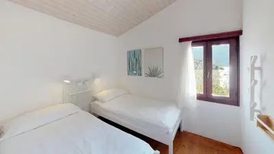 Ein Bett oder Betten in einem Zimmer der Unterkunft Reka-Ferienanlage Brissago