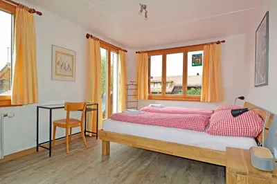 Ein Bett oder Betten in einem Zimmer der Unterkunft Chalet Azeno OG
