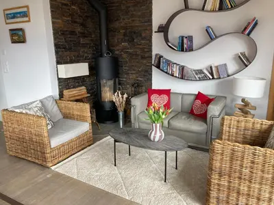 Ein Sitzbereich in der Unterkunft Ferienwohnung Gartenweg